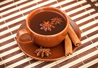 Image showing tea with cinnamon sticks and star anise