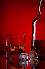 Image showing Whiskey Bottle And Glass