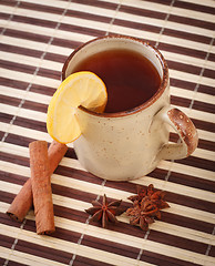 Image showing tea with cinnamon sticks and star anise