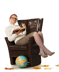 Image showing female teacher sitting in armchair