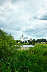 Image showing monastery on lake at evening