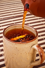 Image showing pouring tea