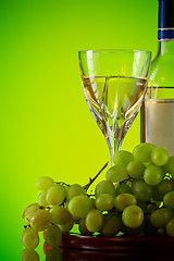 Image showing glass of wine and grape bunch