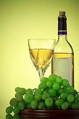 Image showing bottle and glass of wine, grape bunch