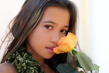 Image showing Asian girl with a rose