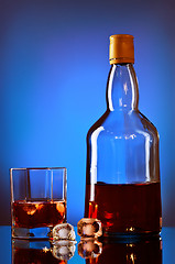Image showing Whiskey Bottle And Glass