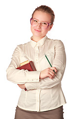 Image showing smiling teacher with book and pen