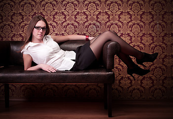 Image showing girl laying on sofa