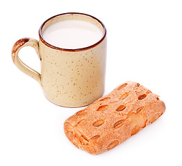 Image showing Crispy Bun and Mug of Milk