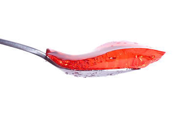 Image showing strawberry jelly on spoon