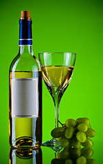 Image showing bottle and glass of wine, grape bunch