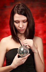 Image showing girl with decoration ball