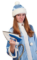 Image showing angry santa girl with iron