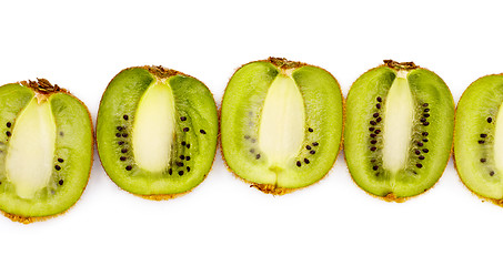 Image showing kiwi halves laying in row