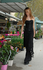 Image showing young girl and florist shop