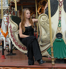 Image showing teen in a carousel