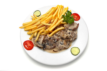 Image showing veal medallion with mushroom white sauce and french fries