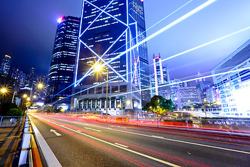 Image showing light trails in city at night