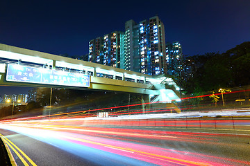 Image showing light trail in city