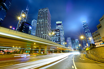 Image showing night traffic light trail and city