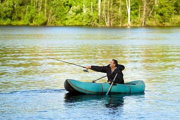 Image showing Fisherman in Rubber Boat