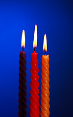 Image showing Three Candles On Blue