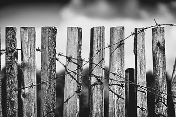 Image showing Fence With Barbed Wire