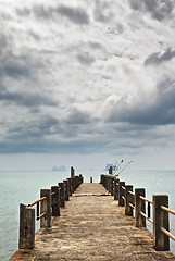 Image showing Pier under Dark Clouds