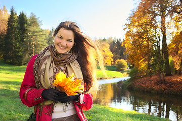 Image showing Girl with Bunch of Leaves