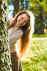 Image showing Girl in Autumn Forest