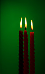 Image showing Three Candles On Green