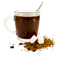 Image showing Coffee in a glass mug with sugar