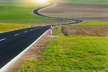 Image showing Winding long road