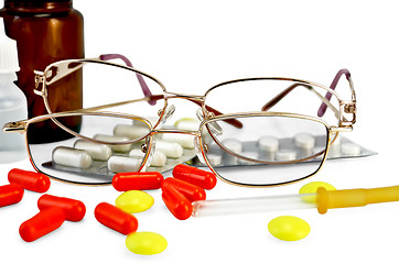 Image showing Eyeglasses with medications