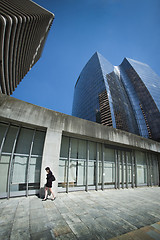 Image showing Woman alone on the phone