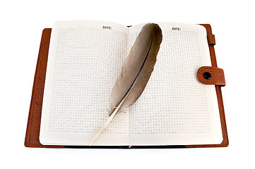 Image showing Notebook with quill