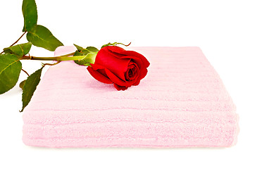 Image showing Towel pink with a red rose