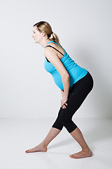 Image showing Pregnant woman stretching