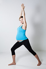 Image showing Pregnant woman doing yoga exercise
