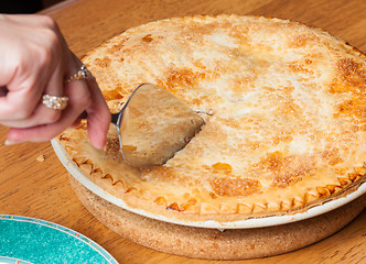 Image showing Home made apple pie on wooden table