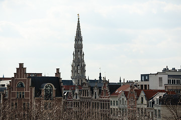 Image showing Brussels City Hall tower over buildings