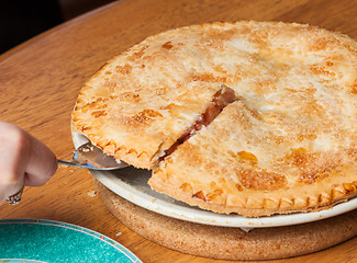 Image showing Home made apple and strawberry pie served