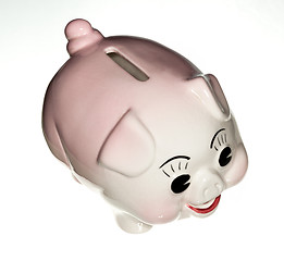 Image showing Pink pottery piggy bank isolated