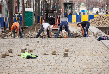 Image showing Workmen rebuild cobbled street in Brussels