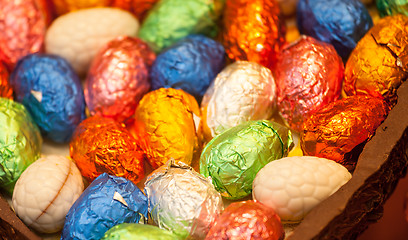 Image showing Foil wrapped easter eggs in chocolate egg