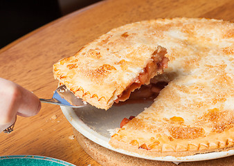 Image showing Home made apple and strawberry pie served