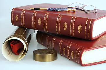 Image showing Books and graduation diploma