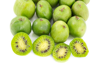 Image showing Sliced kiwi berries and some other