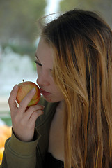 Image showing young girl and red apple