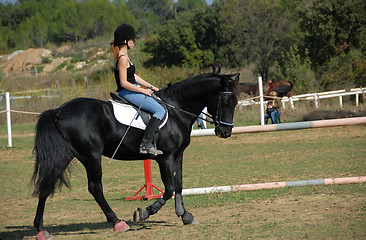 Image showing riding young woman